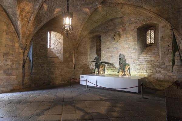 The figures of a perugian griffin and a lion at the entrace to Palazzo dei Priori in Perugia, Umbria region, Italy.