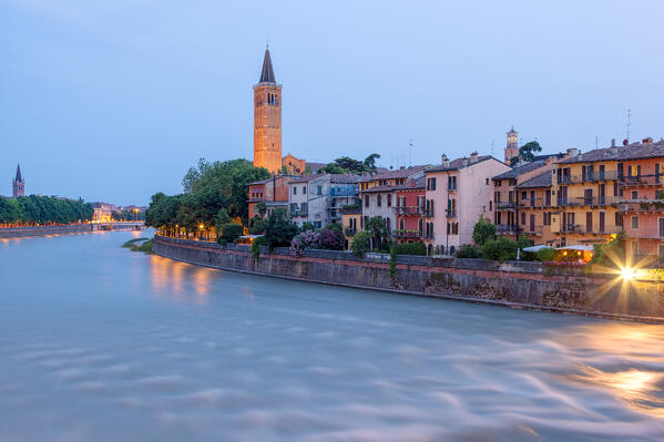River Adige and Basilica of Saint Anastasia at dusk from Ponte Pietra. Verona, Veneto, Italy.