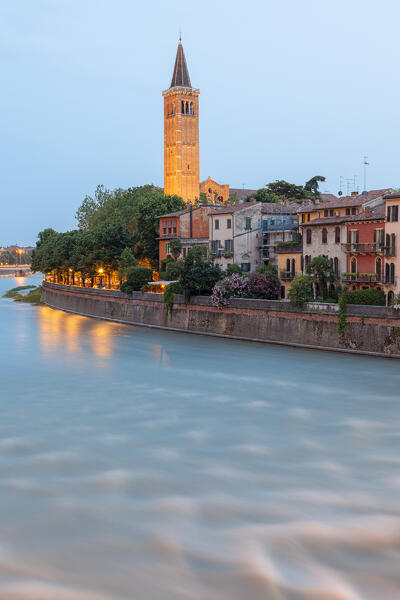 River Adige and Basilica of Saint Anastasia at dusk from Ponte Pietra. Verona, Veneto, Italy.