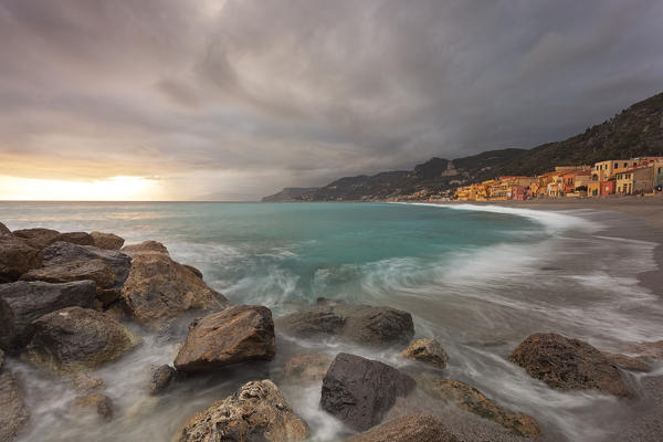 Cloudy sunset on Varigotti beach, Finale Ligure, Savona province, Liguria, Italy