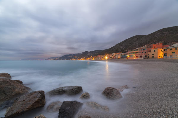 Cloudy dusk on Varigotti beach, Finale Ligure, Savona province, Liguria, Italy