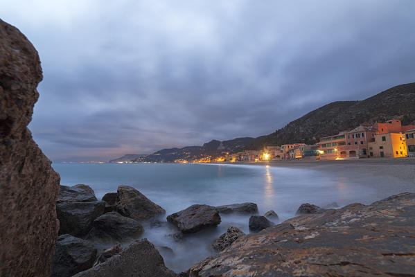 Cloudy dusk on Varigotti beach, Finale Ligure, Savona province, Liguria, Italy