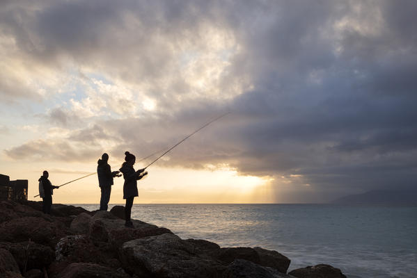 Fishermen on Varigotti beach, Finale Ligure, Savona province, Liguria, Italy