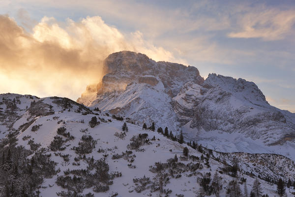 Winter sunset on Croda Rossa d'Ampezzo from Vallandro refuge, Dolomites,  Braies, Bolzano province, South Tyrol, Italy.