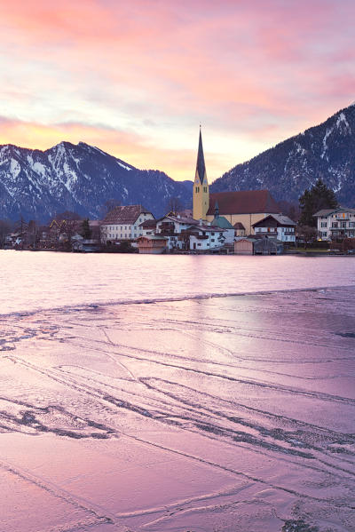 Winter sunrise in Rottach-Egern with the frozen Tegernsee Lake, District Miesbach, Upper Bavaria, Germany, Europe