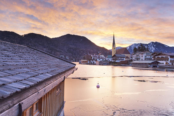Winter sunrise in Rottach-Egern with the frozen Tegernsee Lake, District Miesbach, Upper Bavaria, Germany, Europe