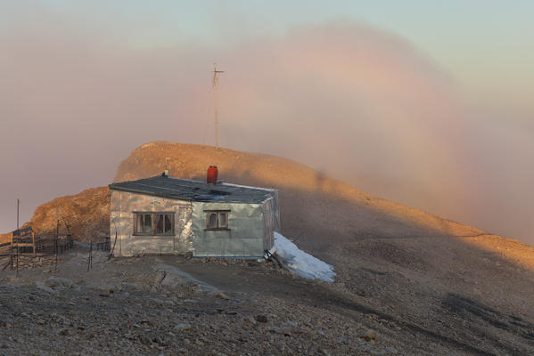 Punta Penia hut at dawn, Marmolada group, Dolomites, Canazei, Trento province, Trentino-Alto Adige, Italy