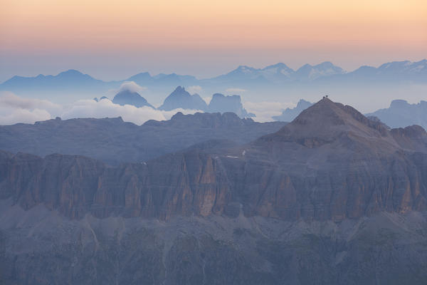 Sella and Odle groups from Punta Penia at dawn, Marmolada group, Dolomites, Canazei, Trento province, Trentino-Alto Adige, Italy