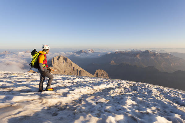 A mountaineer goes down the 