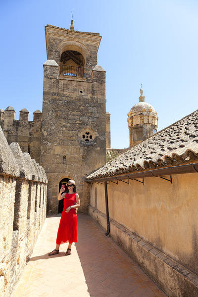 A tourist takes a selfie in Alcàzar de los Reyes Cristianos, Córdoba municipality, province of Córdoba, Andalusia, Spain