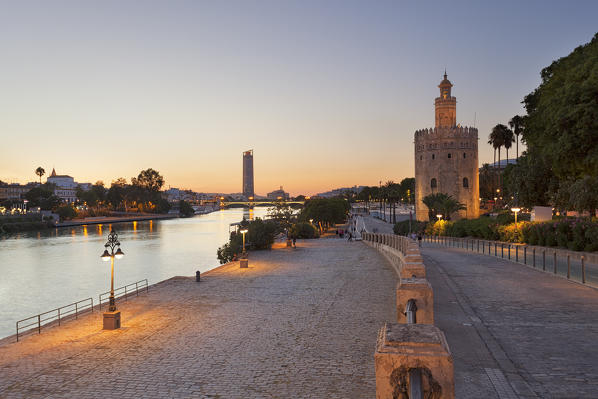 Torre del Oro (Tower of Gold) and river Guadalquivir at dusk, Seville, province of Seville, Andalusia, Spain