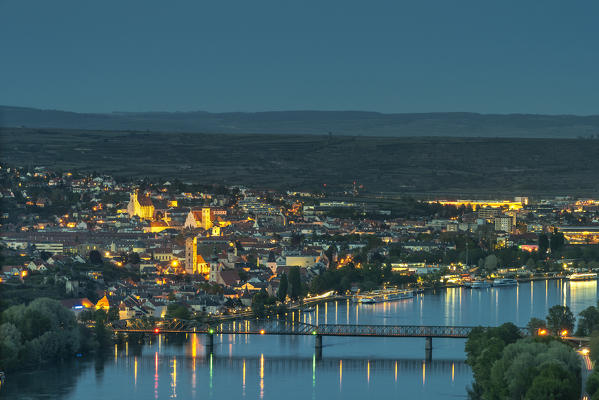 Mautern an der Donau, Bergern im Dunkelsteinerwald, district of Krems, Wachau, Lower Austria, Austria, Europe. The villages of Stein an der Donau and Krems an der Donau at dusk