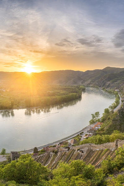 Duernstein, Wachau, Waldviertel, district of Krems, Lower Austria, Austria, Europe. View at sunset from the castle ruin Duernstein to the Danube Bend an the village of Rossatz