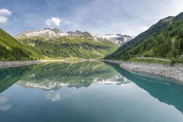 Selva dei Molini, province of Bolzano, South Tyrol, Italy, Europe. The Lake Neves with the peaks Punta Bianca, Dosso Largo and Mesule