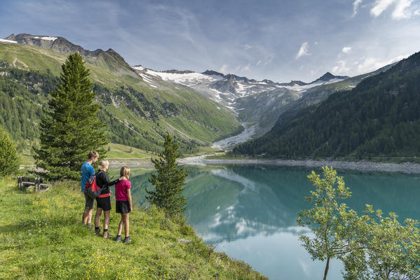 Selva dei Molini, province of Bolzano, South Tyrol, Italy, Europe. The Lake Neves with the peaks Punta Bianca, Dosso Largo, Mesule and Cima di Campo (MR)