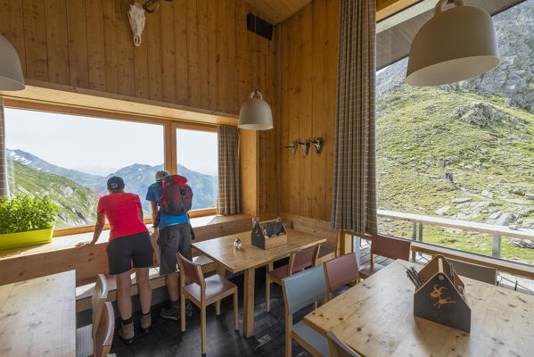 Selva dei Molini, province of Bolzano, South Tyrol, Italy, Europe. The room in the Edelraut refuge with panoramic windows (MR)