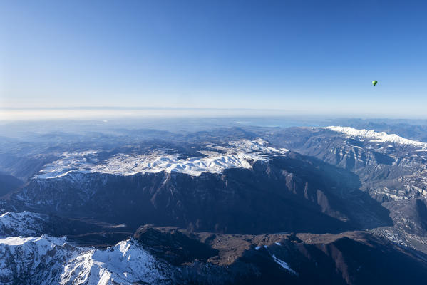 Verona, Prealps, Veneto, Italy Europe. Crossing the alps in a hot air balloon. View from the Balloon to the Lessini Mountains, Mount Baldo, Lake Garda and the Padana Plain