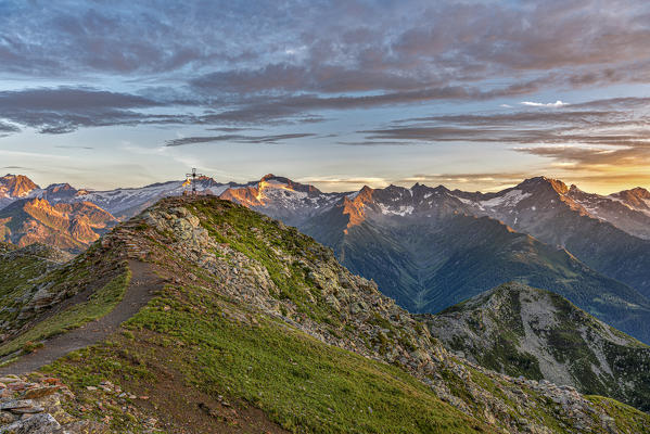 Sand in Taufers / Campo Tures, Bolzano province, South Tyrol, Italy. Sunrise at the summit of Speikboden