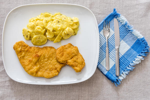 Vienna, Austria, Europe. The traditional Wiener Schitzel with potato salad