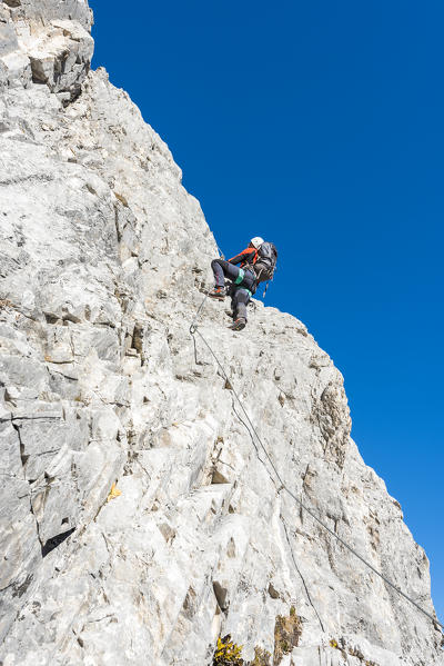 Mount Grosse Kinigat, Kartitsch, East Tyrol, Austria, Europe. Climber on the via ferrata