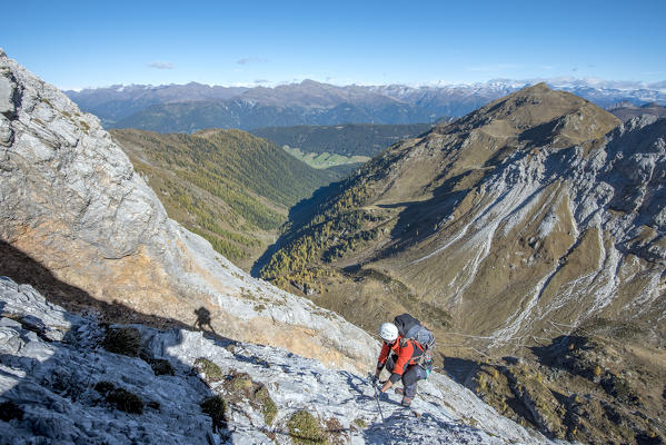 Mount Grosse Kinigat, Kartitsch, East Tyrol, Austria, Europe. Climber on the via ferrata