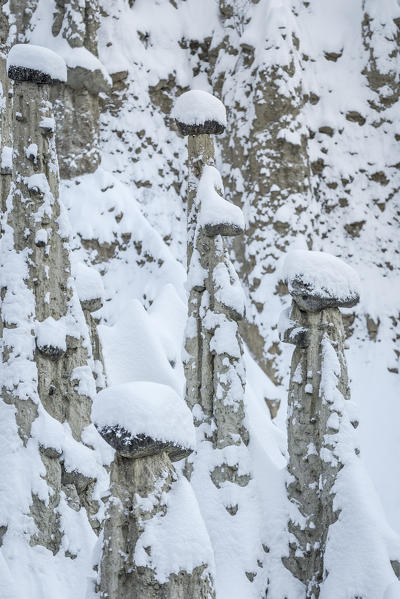 Perca/Percha, province of Bolzano, South Tyrol, Italy, Europe. Winter at the Earth Pyramids
