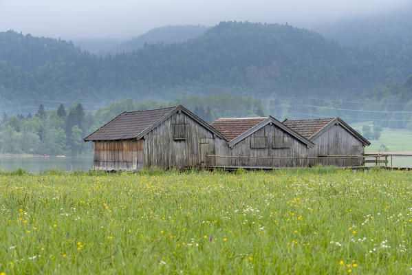 Schlehdorf, Kochel Lake, Bad Tölz-Wolfratshausen district, Upper Bavaria, Germany, Europe. Three boathouses in the Kochel Lake