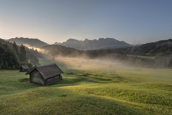 Gerold Lake, Krün, Garmisch-Partenkirchen district, Upper Bavaria, Bavaria, Germany, Europe. Sunrise at Gerold Lake with the Karwendel Alps in the background