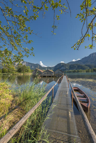 Schlehdorf, Kochel Lake, Bad Tölz-Wolfratshausen district, Upper Bavaria, Germany, Europe. Three boathouses in the Kochel Lake