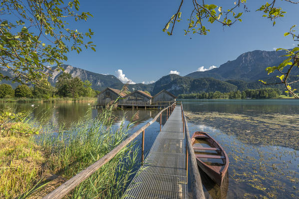 Schlehdorf, Kochel Lake, Bad Tölz-Wolfratshausen district, Upper Bavaria, Germany, Europe. Three boathouses in the Kochel Lake