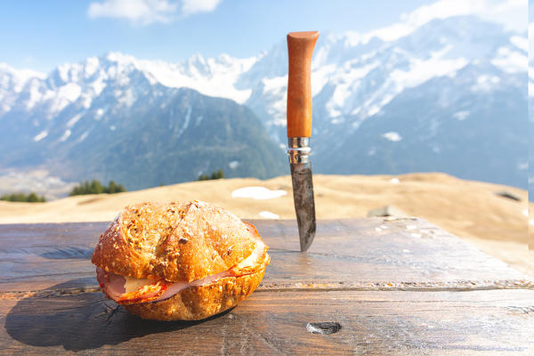 Lunch break at Alpe Tombal, Bregalia valley, Canton of Graubünden, Switzerland