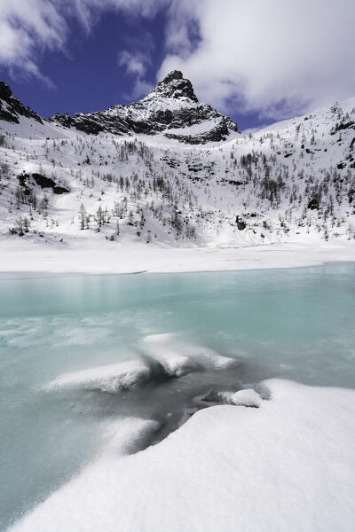 Lagazzuolo lake at thaw, Valmalenco, Valtellina, Sondrio province in Lombardy district, Italy.