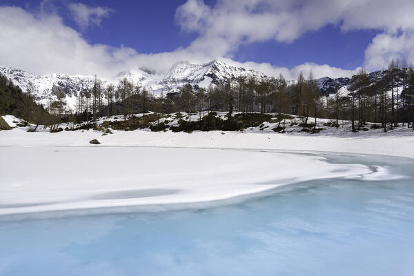 Lagazzuolo lake at thaw, Valmalenco, Valtellina, Sondrio province in Lombardy district, Italy.