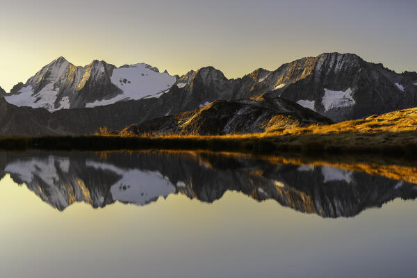 Autumn sunrise in Tonale pass, Ponte di Legno in Brescia province, Lombardy district in Italy.