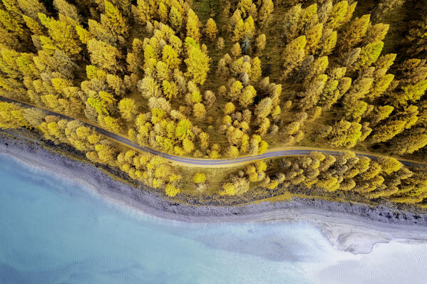 Lake of Livigno from aerial  in autumn season in sunrise, Valtellina, Sondrio province, Lombardy, Italy