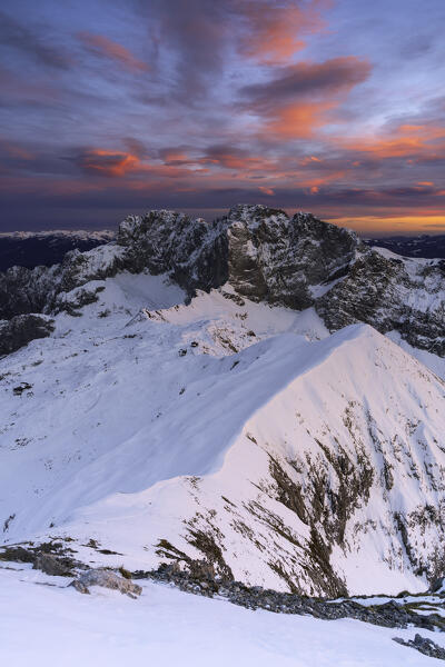 Sunset from Monte Ferrante in winter season, Orobie Alps in Bergamo province, Lombardy district, Italy, Europe.