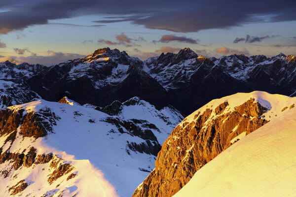 Sunset from Monte Ferrante in winter season, Orobie Alps in Bergamo province, Lombardy district, Italy, Europe.