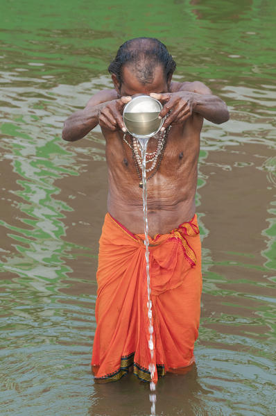 Varanasi, Uttar Pradesh, India, Asia. Devote in the Ganges.