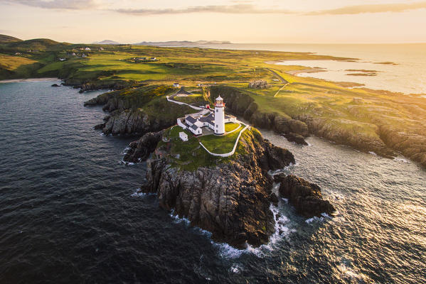 Fanad Head (Fánaid) lighthouse, County Donegal, Ulster region, Ireland, Europe. Aerial view of the Fanad lighthouse at sunset.