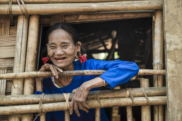 Rakhine state, Myanmar. Chin woman with traditional tattooed face.