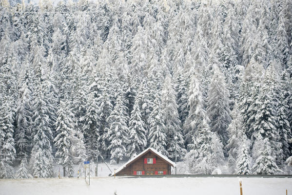 Lonely house in winter. Celerina, Engadine, Switzerland
