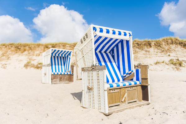 Hörnum, Sylt island, North Frisia, Schleswig-Holstein, Germany.  Strandkorbs on the beach.