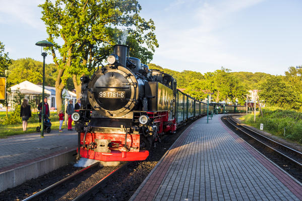 Rugen Island, Baltic coast, Mecklenburg-Western Pomerania, Germany. The historical Rugensche Baderbahn steam train called 