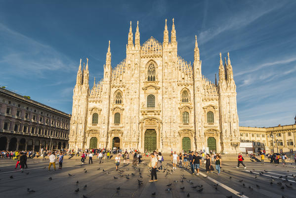 Milan, Lombardy, Italy. The facade of the Milan's Cathedral (Duomo) at sunset.