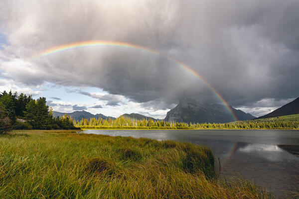 stormy weather and rainbow at Vermillion Lakes, Banff National Park, Canadian Rockies, Canada.