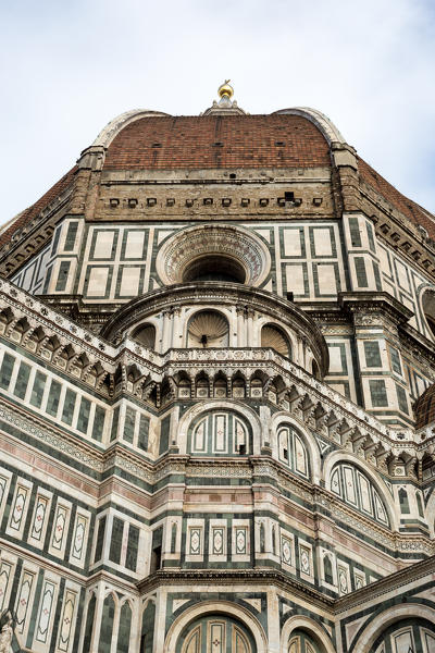 Florence, Tuscany, Italy. The front of the famous cathedral with Brunelleschi dome details.