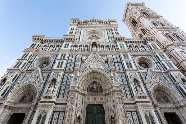 Florence, Tuscany, Italy. The front of the famous cathedral with Giotto Tower on the right.