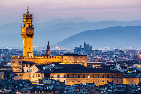 Florence, Tuscany, Italy. cityscape and Palazzo Vecchio. Sunset, lights on.