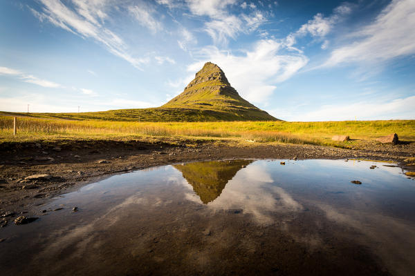 Kirkjufell Mountain, Snaefellsnes peninsula, Iceland. Landscape with waterfalls, long exposure in a sunny day