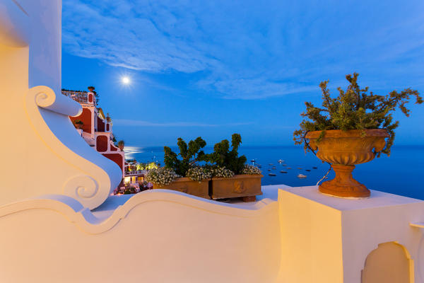 Positano, Amalfi Coast, Campania, Sorrento, Italy. View of the town and the seaside in a summer sunset